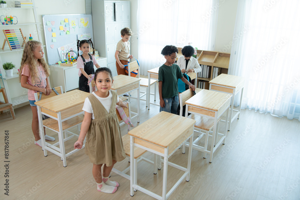 Fototapeta premium Teacher and students, In the morning to begin learning and studying in a classroom of school.