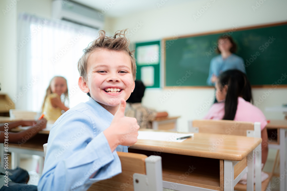 Teacher and students, Learn and study in a classroom of school where youngsters sit and listen attentively. Teacher and students, Learn and study in a classroom of school where youngsters sit and listen attentively.