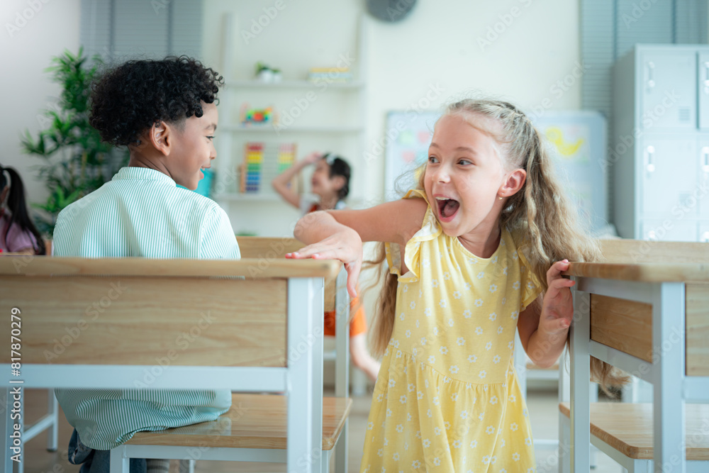 Obraz premium Students learn and study in a classroom of school where youngsters sit and listen attentively.