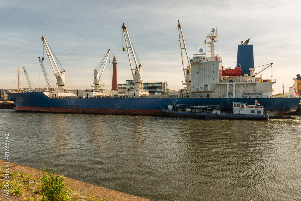 cargo ship with four cranes on board cargo ship with four cranes on board