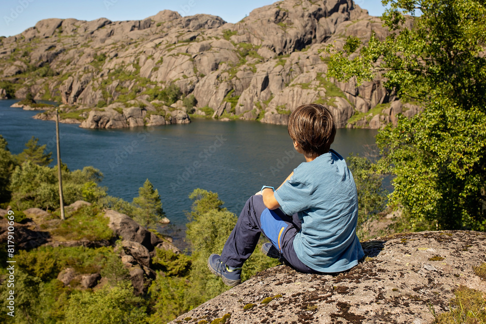 Naklejka premium Happy people, enjoying amazing views in South Norway coastline, fjords, lakes, beautiful nature