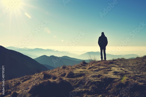 Lone Male Hiker on Scenic Mountain Ridge  Adventure  Solitude  and Breathtaking Landscape