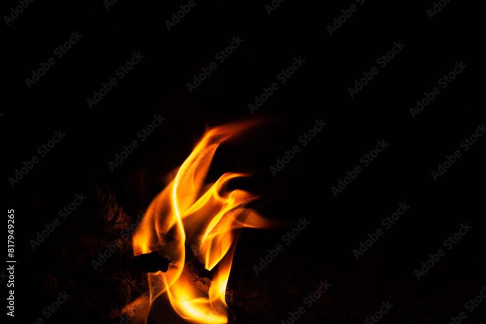 Fire texture on a black background. The fire pattern at night has its own impression. Fire texture on a black background. The fire pattern at night has its own impression.