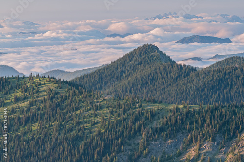 Landscape at sunset of the Cascade Mountains in clouds outside of Mt. Ranier National Park, Washington, USA