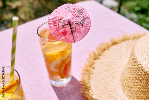 Summer refreshing lemonade drink with grapefruit, lemon and orange slices. Fresh healthy cold citrus beverage. Citrus fruit infused water.