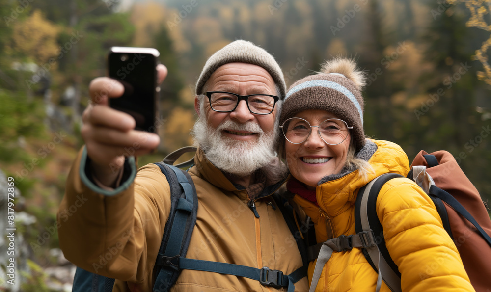 Joyful elderly couple takes a selfie in nature. Happy and loving elderly people. Happy Persia. Joyful elderly couple takes a selfie in nature. Happy and loving elderly people. Happy Persia.