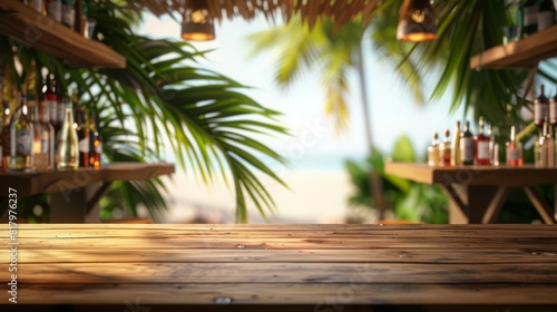 Fototapeta Naklejka Na Ścianę i Meble -  Empty wooden table top for product display, presentation stage. Tropical summer, palm trees, beach bar, white sand and blue ocean in the background. 