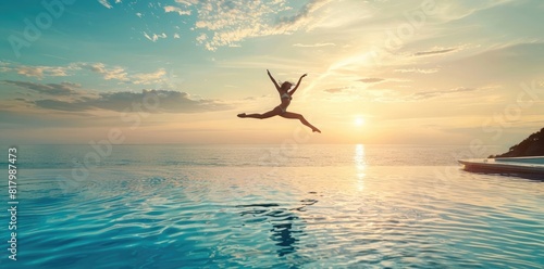 A professional dancer is jumping in the air on an infinity pool with clear blue water overlooking the sea, sunrise, minimalistic, editorial photography photo