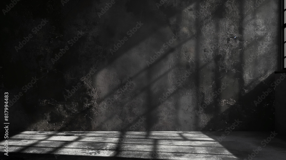 A dark room with a window that casts a shadow on the wall A dark room with a window that casts a shadow on the wall