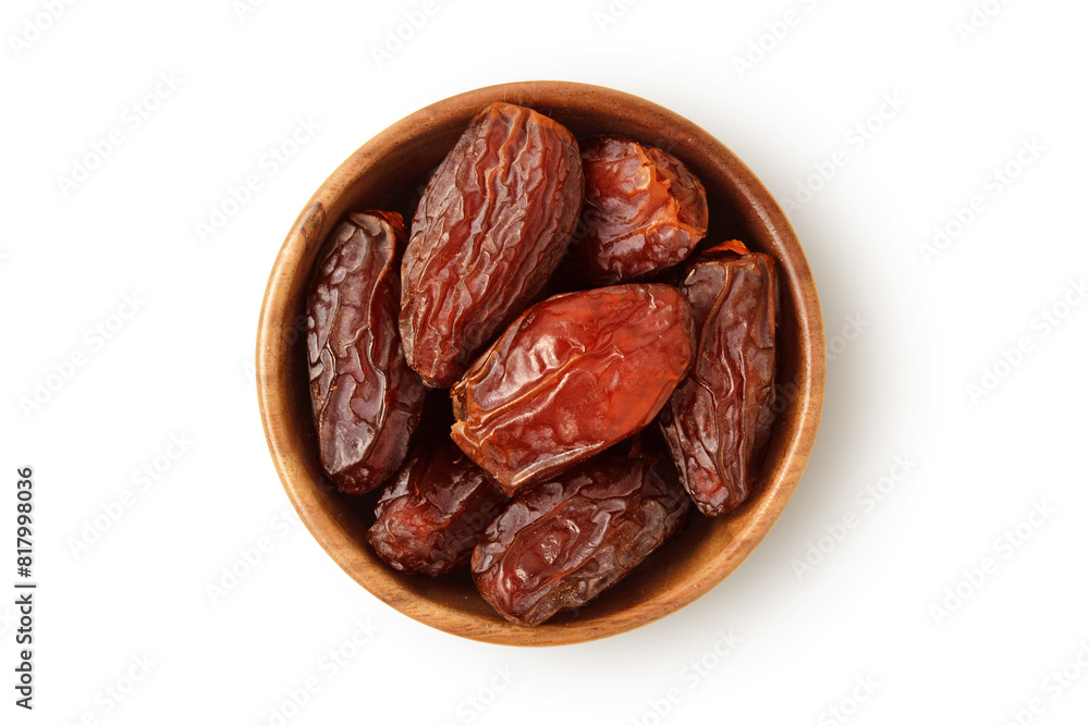 Dried dates in wooden bowl on white background Dried dates in wooden bowl on white background