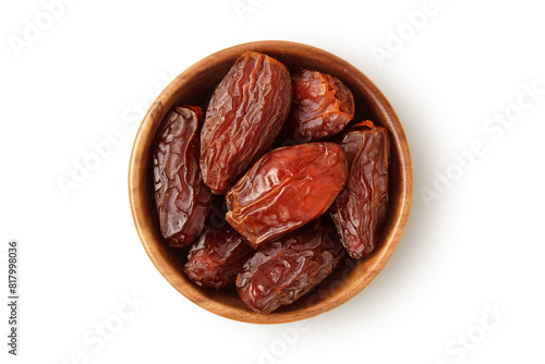 Dried dates in wooden bowl on white background © calypso77