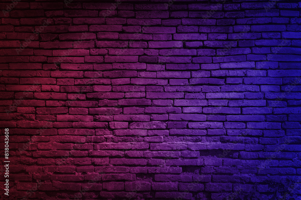 Neon light on brick walls that are not plastered background and texture. Lighting effect red and blue neon background of empty brick basement 