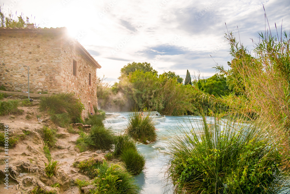 Fototapeta premium Natural spa with waterfalls in saturnia Tuscany, Italy