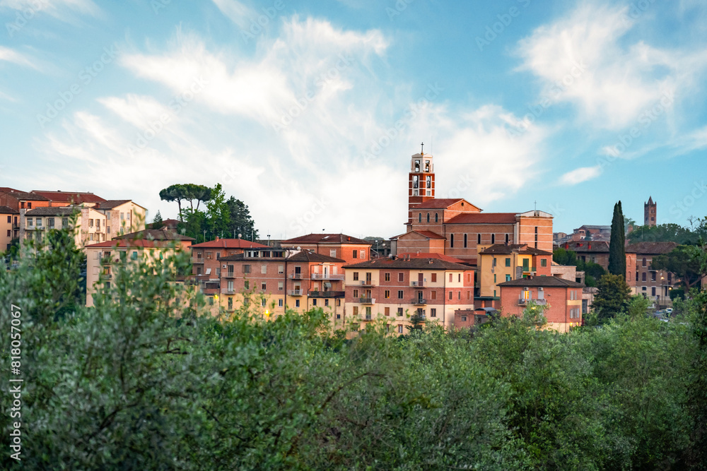 Obraz premium Siena, medieval town in Tuscany, with view of the Dome & Bell Tower of Siena Cathedral, Mangia Tower and Basilica of San Domenico, Italy
