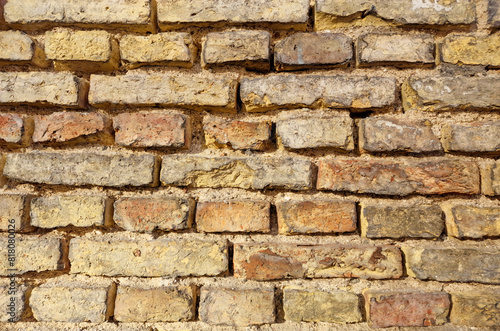 old fortress wall of stones. Background of medieval brickwork for design.