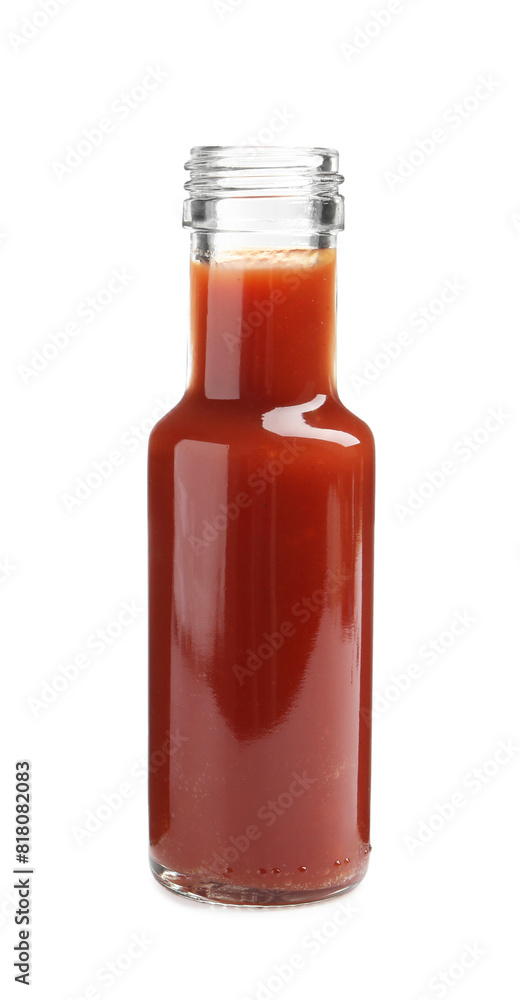 Tasty ketchup in glass bottle isolated on white. Tomato sauce Tasty ketchup in glass bottle isolated on white. Tomato sauce
