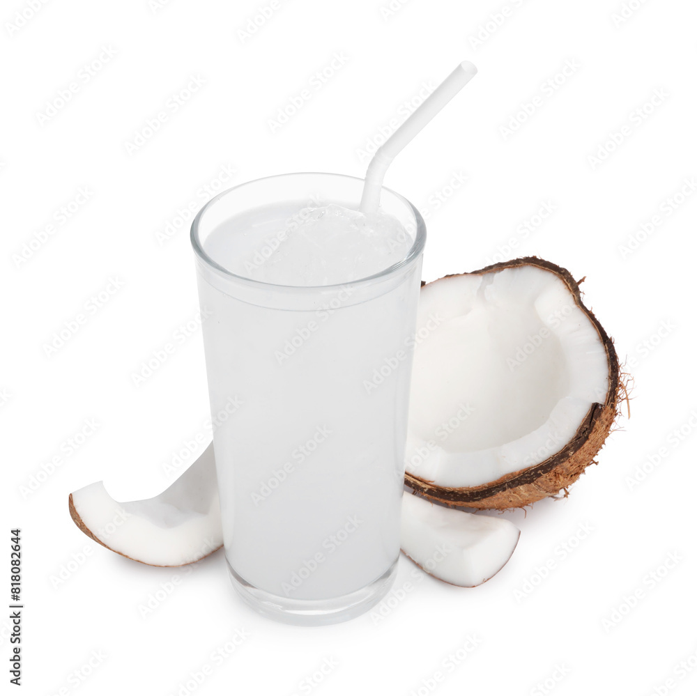 Glass of coconut water, ice cubes and nut isolated on white Glass of coconut water, ice cubes and nut isolated on white