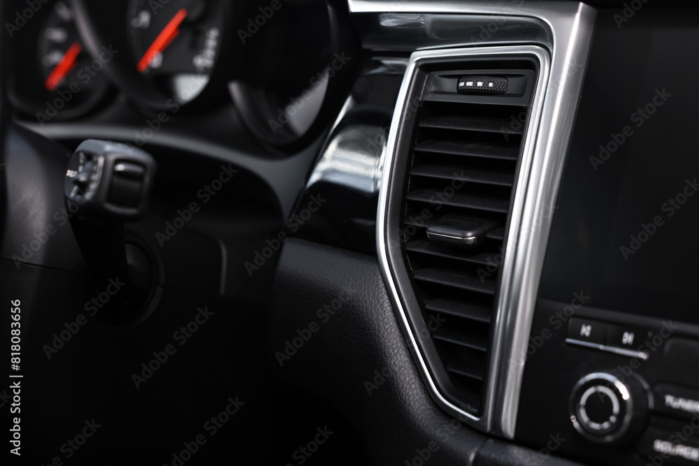 Inside of modern black car, closeup view