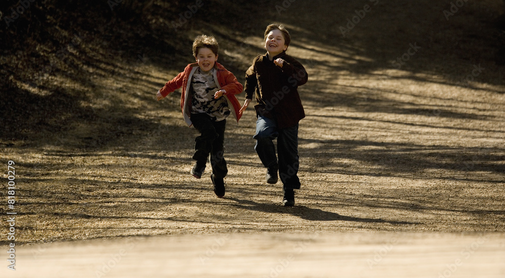 Fototapeta premium Boys Running Together