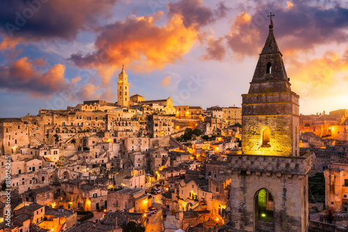 Panoramic view of the ancient town of Matera (Sassi di Matera) in a beautiful autumn day, Basilicata, southern Italy. Stunning view of the village of Matera. Matera is a city on a rocky outcrop. photo