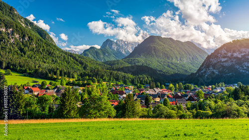 Kranjska Gora town in Slovenia at summer with beautiful nature and mountains in the background. View of mountain landscape next to Kranjska Gora in Slovenia, view from the top the town Kranjska Gora.