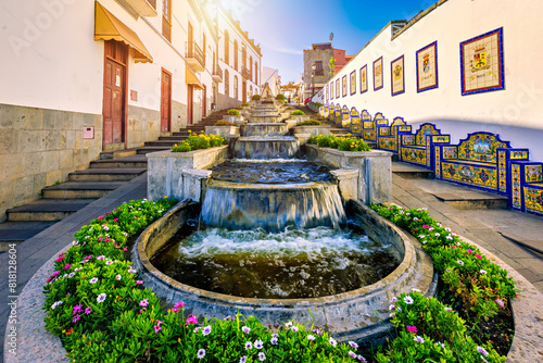 Famous Paseo de Canarias street on Firgas, Gran Canaria, Canary Islands, Spain. Fountain of natural mineral water in Firgas, Gran Canaria. Village Firgas at Gran Canaria, Paseo de Canarias photo