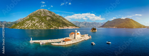 Saint George Island and Church of Our Lady of the Rocks in Perast, Montenegro. Our Lady of the Rock island and Church in Perast on shore of Boka Kotor bay (Boka Kotorska), Montenegro, Europe. photo