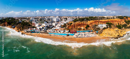 Amazing view from the sky of town Olhos de Agua in Albufeira, Algarve, Portugal. Aerial coastal view of town Olhos de Agua, Albufeira area, Algarve, Portugal. photo