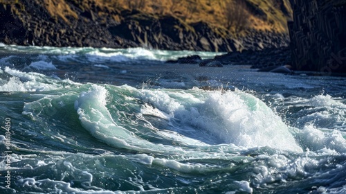 A constant tugofwar between the calm river and the powerful whirlpool each one struggling for dominance. photo