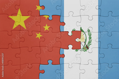 puzzle with the colourful national flag of guatemala and flag of china . © luzitanija