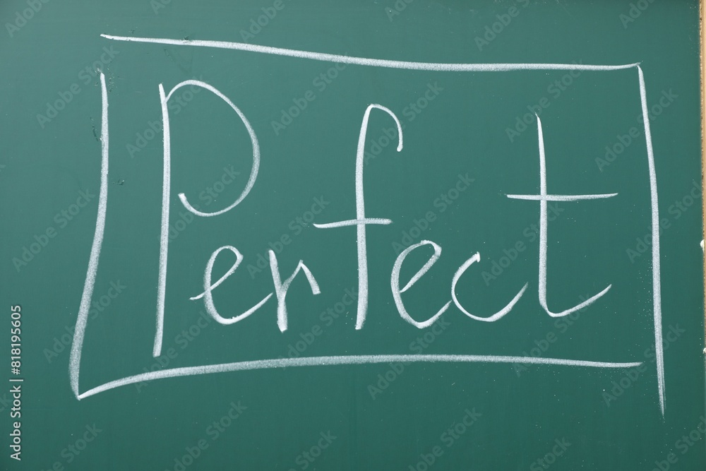 English grammar rules written with chalk on green board English grammar rules written with chalk on green board