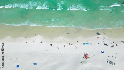 White sand beach with dunes and azure sea of the beach Cabo Frio, Arraial do Cabo, Brazil. Aerial top view. photo