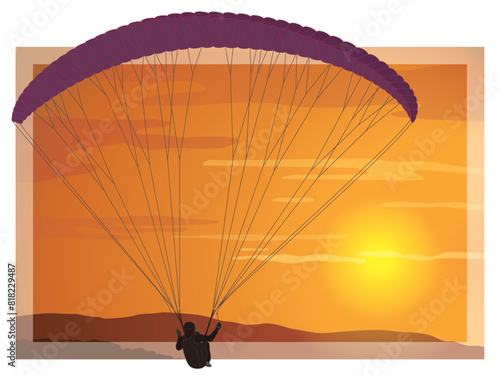 paragliding sport, glider flying with a fabric wing in a sunset sky with mountains below in the background