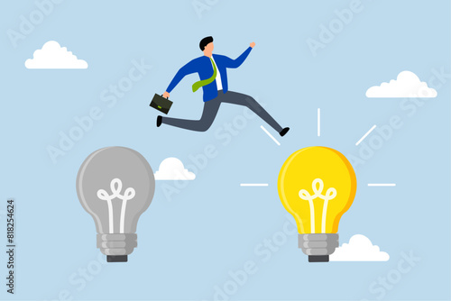 Business transformation, businessman jumps from old to ashiny new light bulb idea.