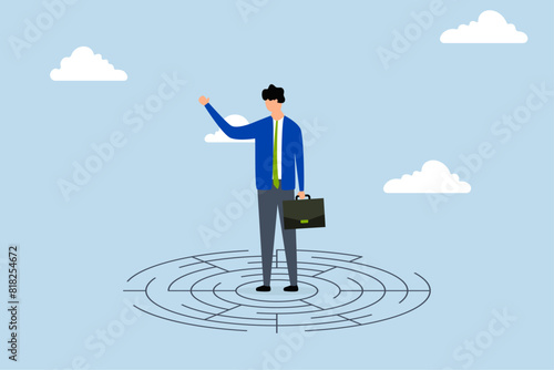 Solving complex business problem, confused businessman in middle of maze looking for way out 