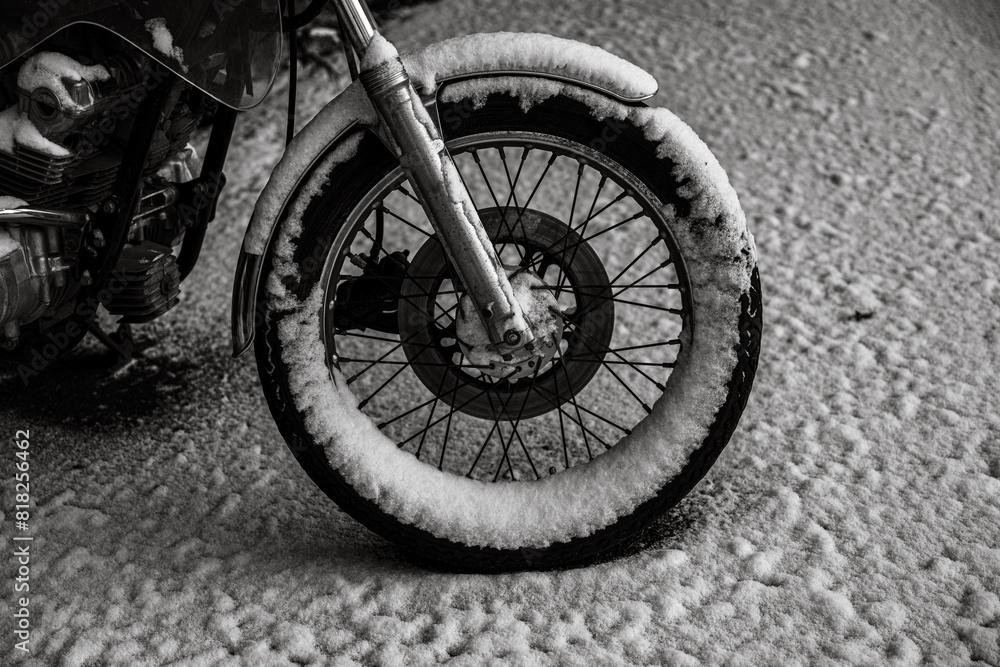 Front Wheel from an Old Motorbike in Winter Front Wheel from an Old Motorbike in Winter