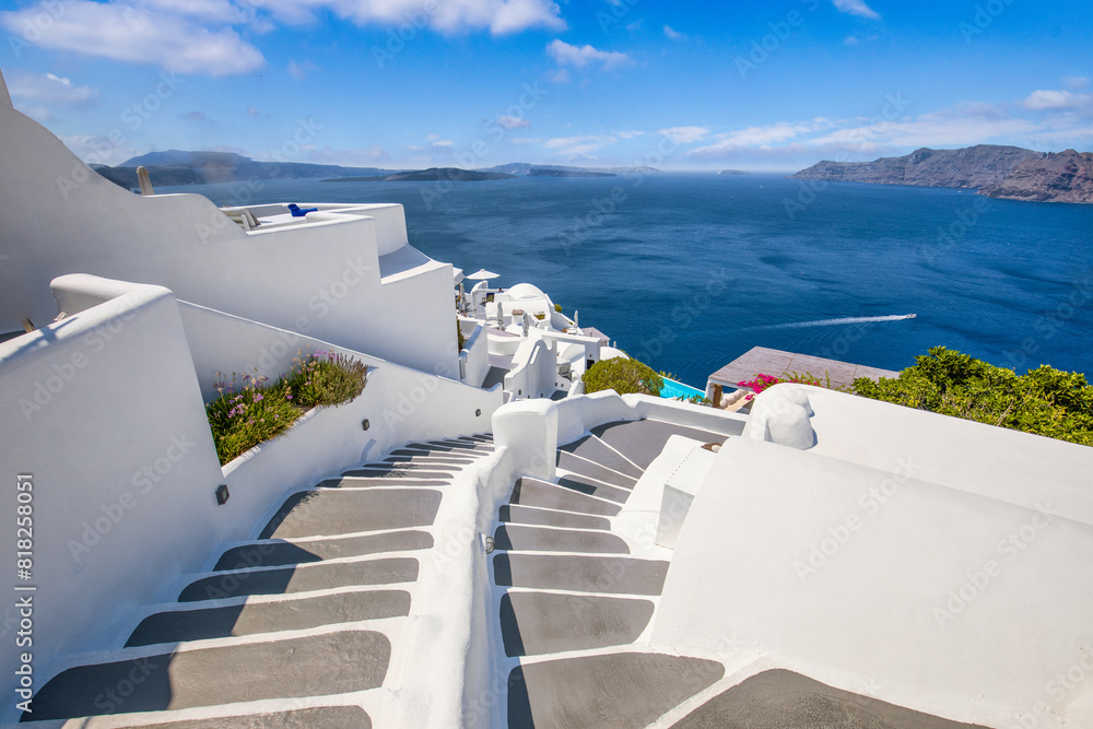 Obraz premium Amazing picturesque landscape, luxury travel vacation. Oia town stairs over sea view Santorini island, Greece. Traditional famous white houses Caldera. Sunny sky, romance couple vacation summer scene