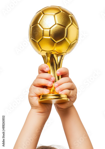  child's hand raised, holding a gold soccer cup isolated on a transparent background