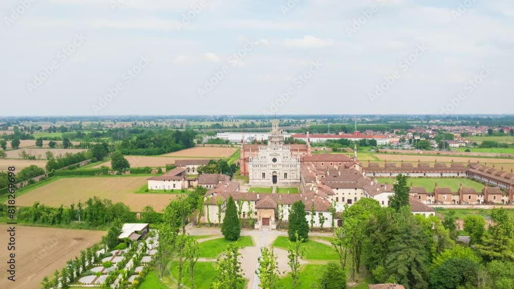 Aerial shot of Certosa di Pavia cathedral a historical monumental complex that includes a monastery and a sanctuary. Pavia ,Italy. Aerial shot of Certosa di Pavia cathedral a historical monumental complex that includes a monastery and a sanctuary. Pavia ,Italy.