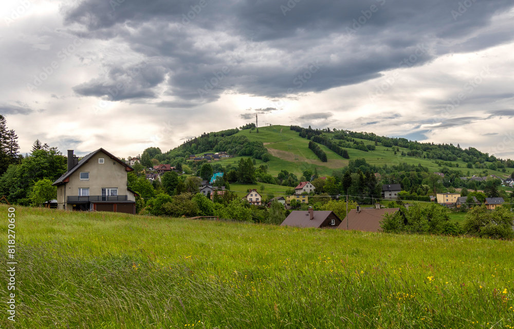 View from Koniaków to Ochodzita under dramatic skies View from Koniaków to Ochodzita under dramatic skies