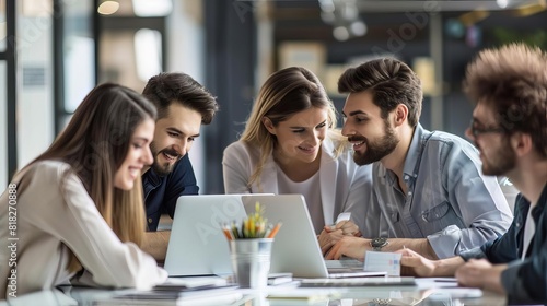 successful business team with laptop in modern office meeting discussion professional setting