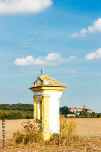 palace in Jaroslavice with calvary chapel, Czech Republic photo