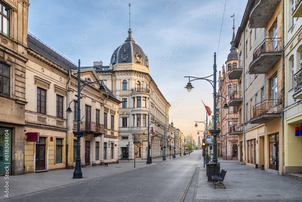 Fototapeta premium Lodz, Poland. Famous Piotrkowska pedestrian street with beautiful old buildings