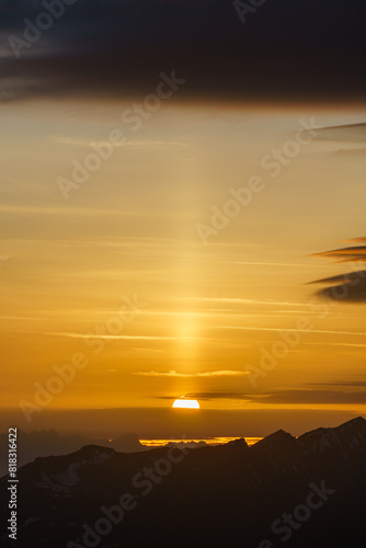 Sunrise at the summit of the mountain 