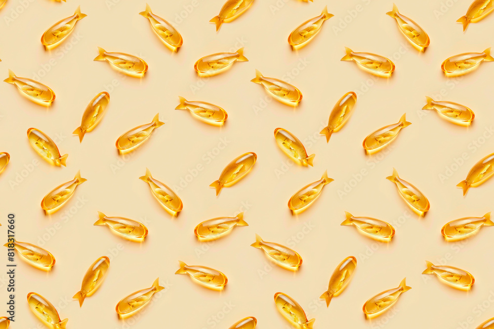 Seamless pattern of golden fish-shaped capsules on a light beige background Seamless pattern of golden fish-shaped capsules on a light beige background