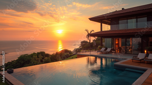 sunset at the pool of a villa house