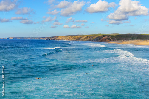 Atlantic ocean coastline and beach popular among surfers and tourists in Praia da Bordeira  Algarve  Portugal