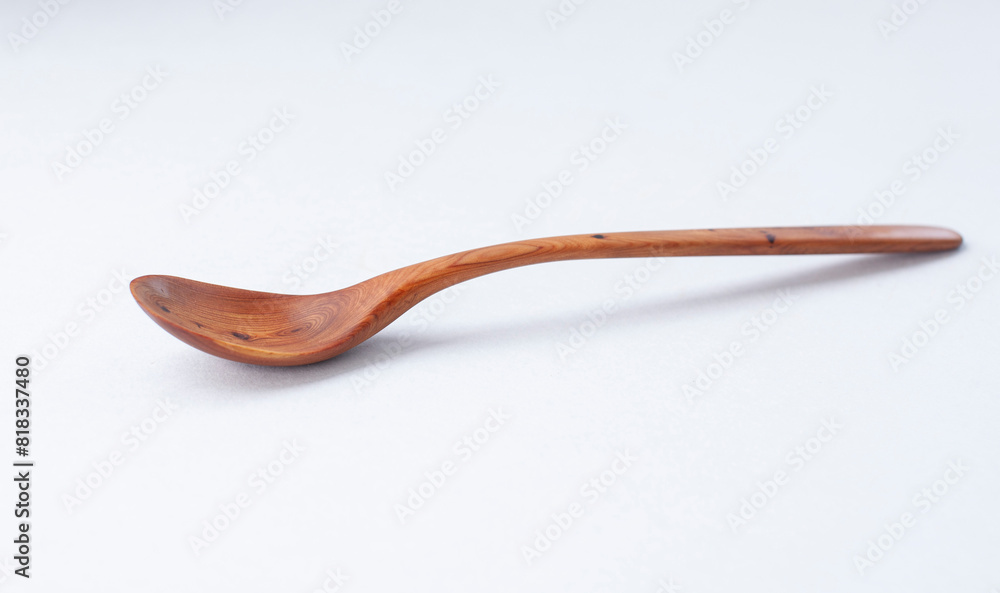 Wooden kitchen utensils stacked view, spoon and spatula Wooden kitchen utensils stacked view, spoon and spatula