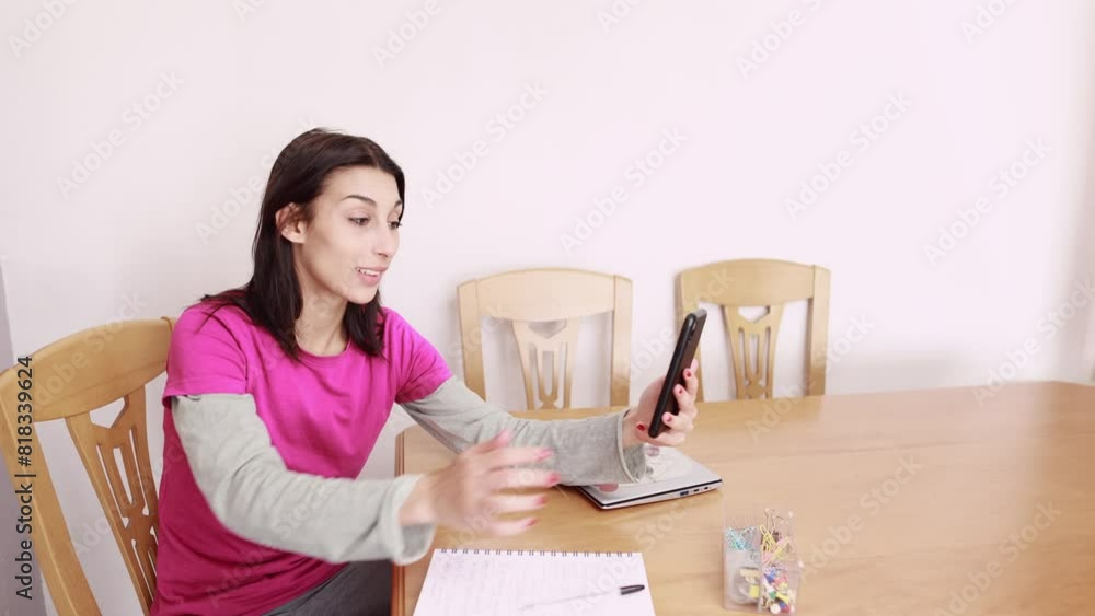 Cellphone video call from home remote work Business communication. Generation z woman entrepreneur Cellphone video call from home remote work Business communication. Generation z woman entrepreneur