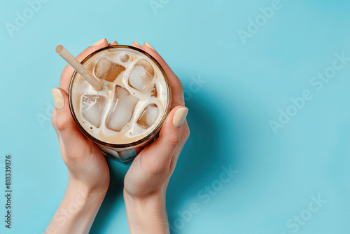 A Woman Hands Holding an Ic...